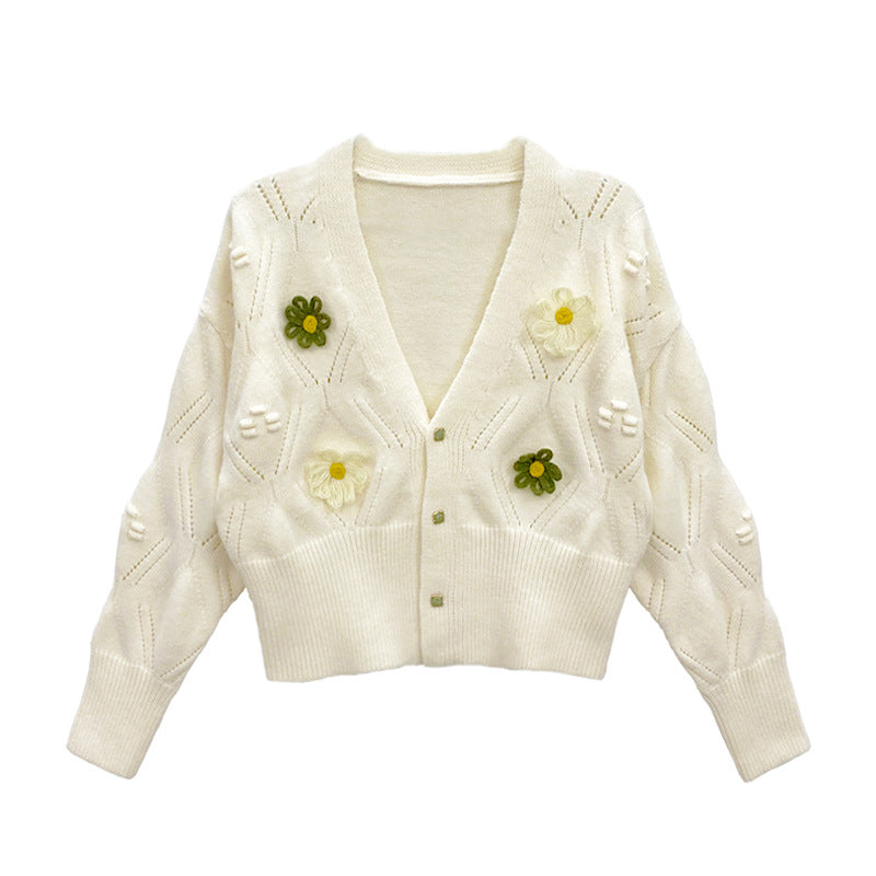 Dame cardigan med blomsterapplikasjoner og elegant V-hals Skjora