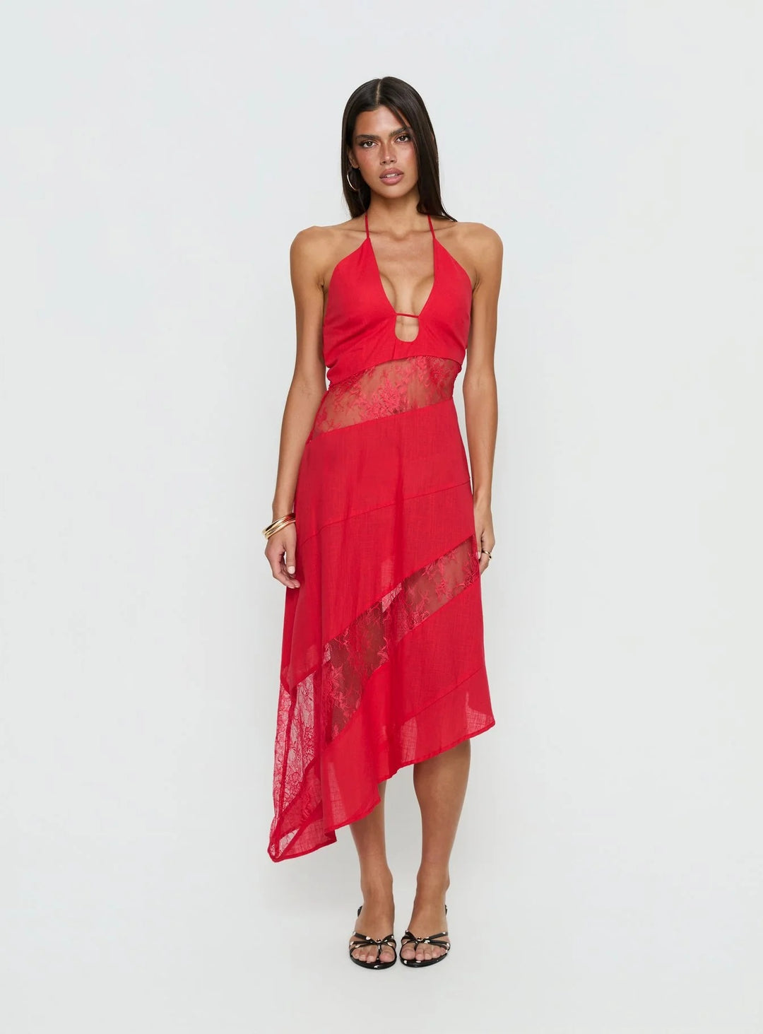 Women's halter neck dress with sheer inserts and asymmetric hem Skjora