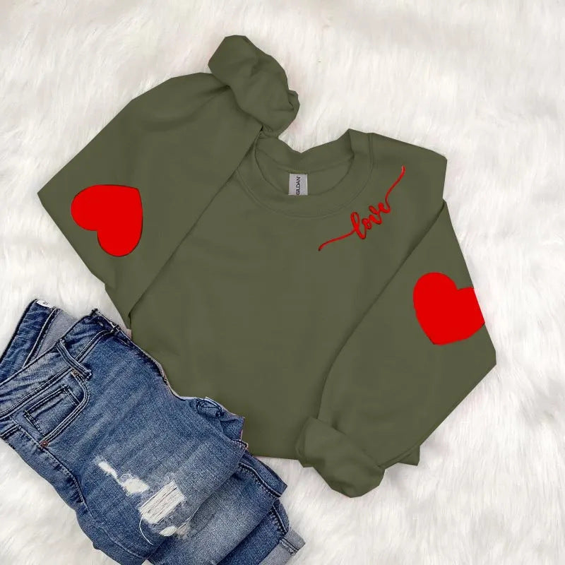 Dame sweatshirt med hjerte design og avslappet passform Skjora