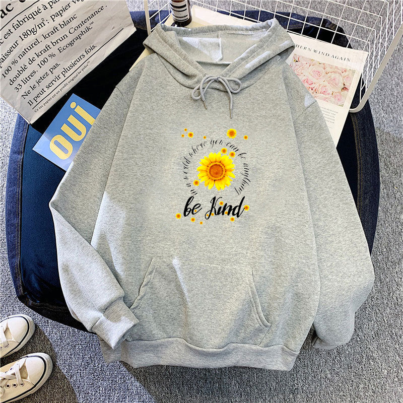 Dame hettegenser med inspirerende solblommotiv Skjora