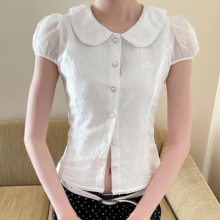 Dame elegant bluse med ståkrage og dekorative knapdetaljer Skjora