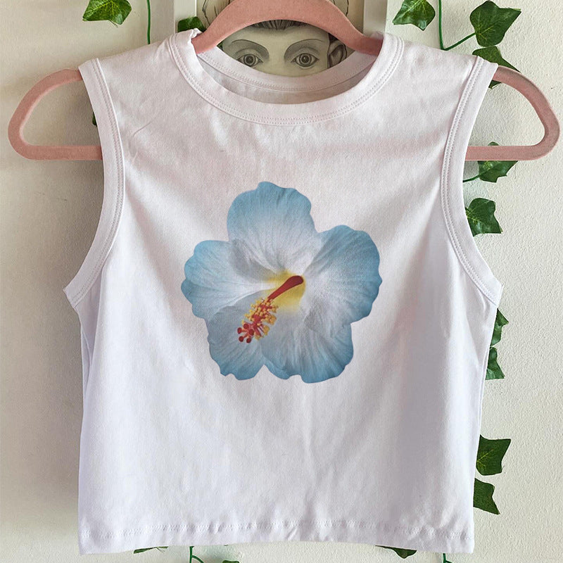 Dame ermeløs skjorte med floralt hibiskusmotiv Skjora
