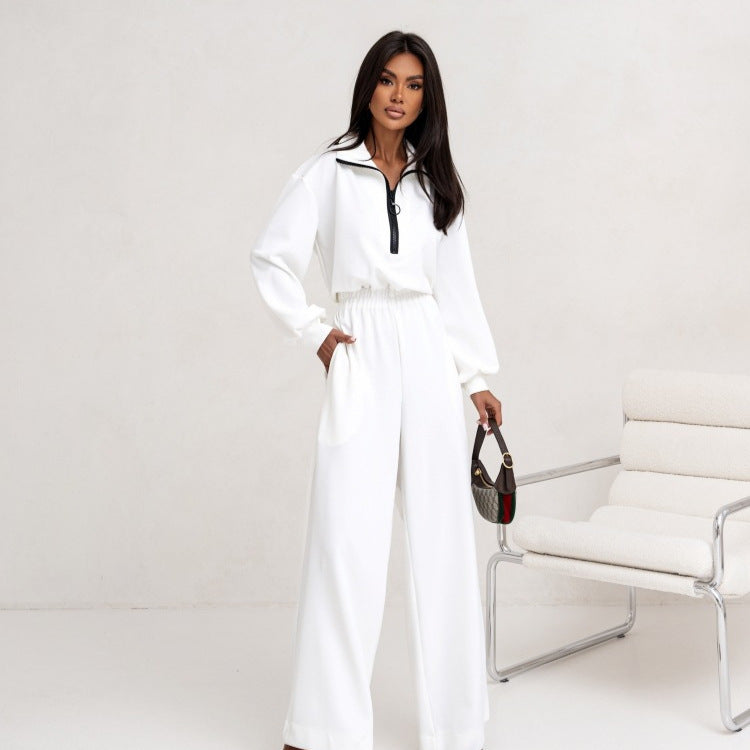 Damer sporty jumpsuit med høy krage og moderne glidelås Skjora