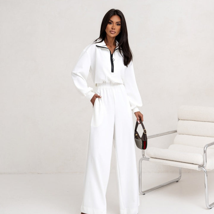 Damer sporty jumpsuit med høy krage og moderne glidelås Skjora