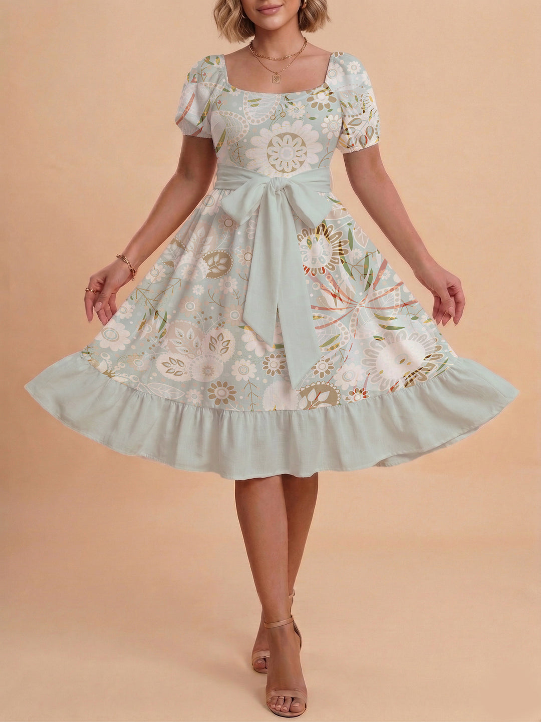 Damen modernes Blumenkleid mit elegantem Taillengürtel und asymmetrischem Saum Skjora