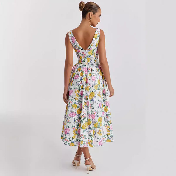 Dame midi kjole med blomsterdetaljer og tilpasset topp