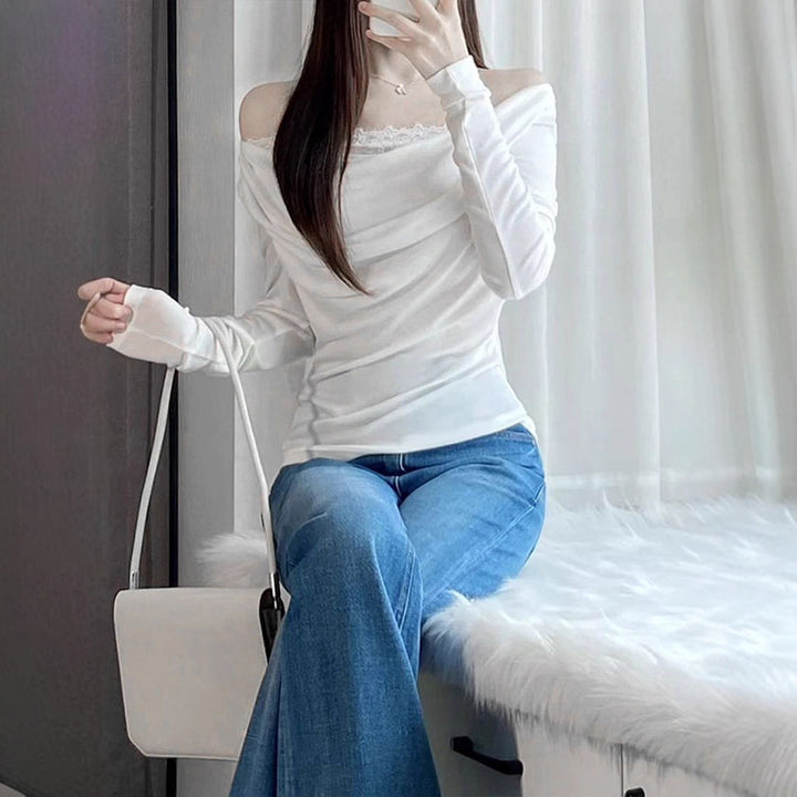 Dame langermet bluse med asymmetrisk utringning og elegant drapering Skjora