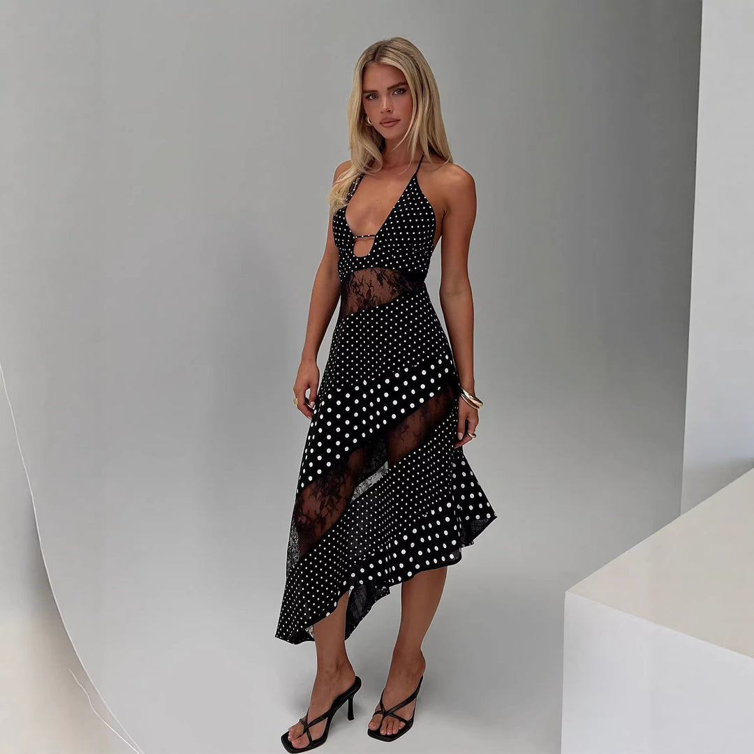 Women's halter neck dress with sheer inserts and asymmetric hem Skjora