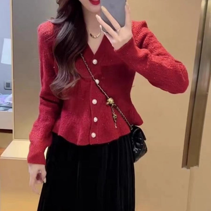 Dame cardigan med dekorative knapper og elegant snitt Skjora