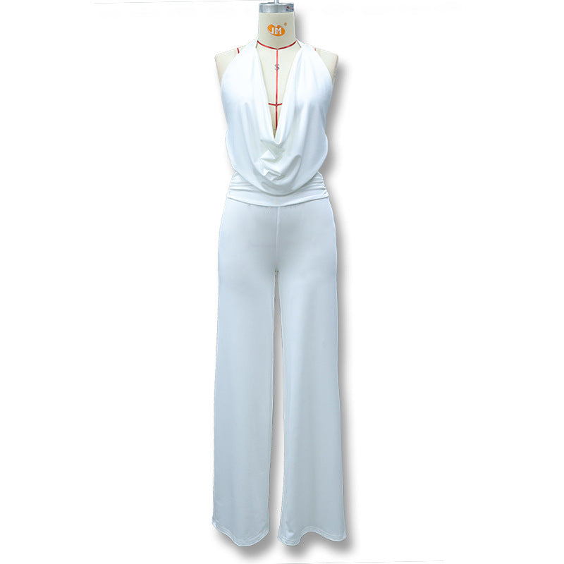Dame jumpsuit med elegant innpakningsdetalj og vide benpartier Skjora