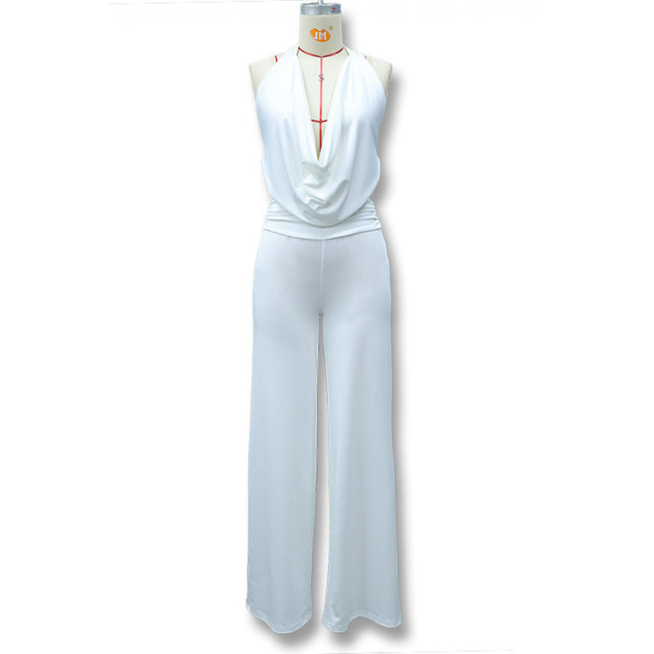 Dame jumpsuit med elegant innpakningsdetalj og vide benpartier Skjora