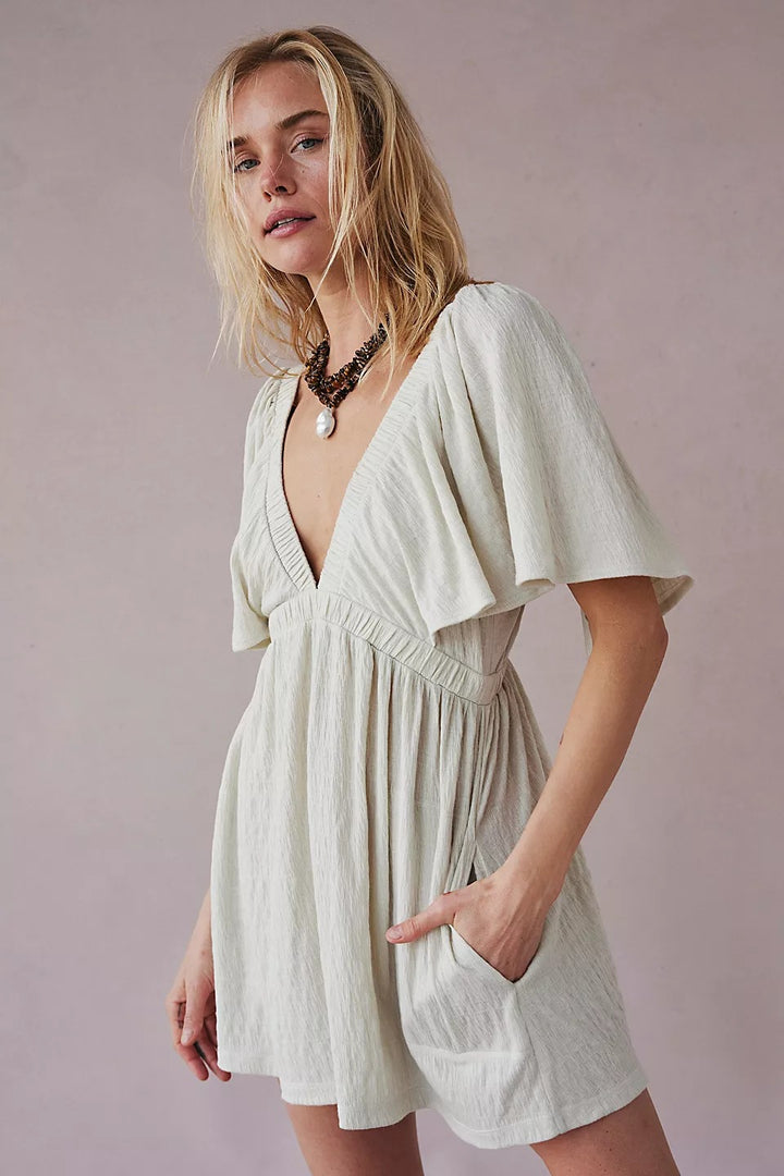 Dame luftig jumpsuit med bred passform og V-hals Skjora