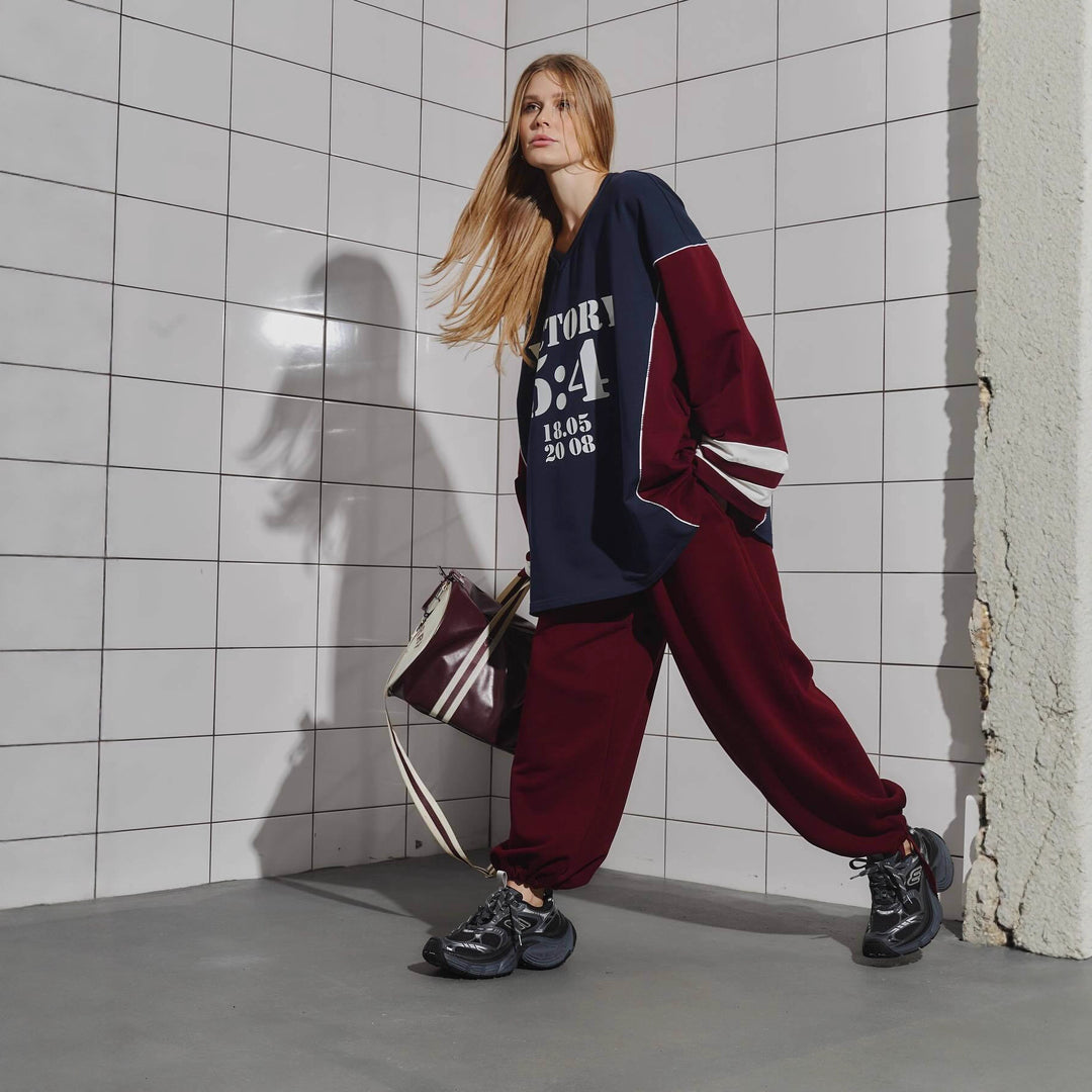 Kvinne Oversized Treningsdrakt med Grafisk Trykk og Bred Bukse Skjora