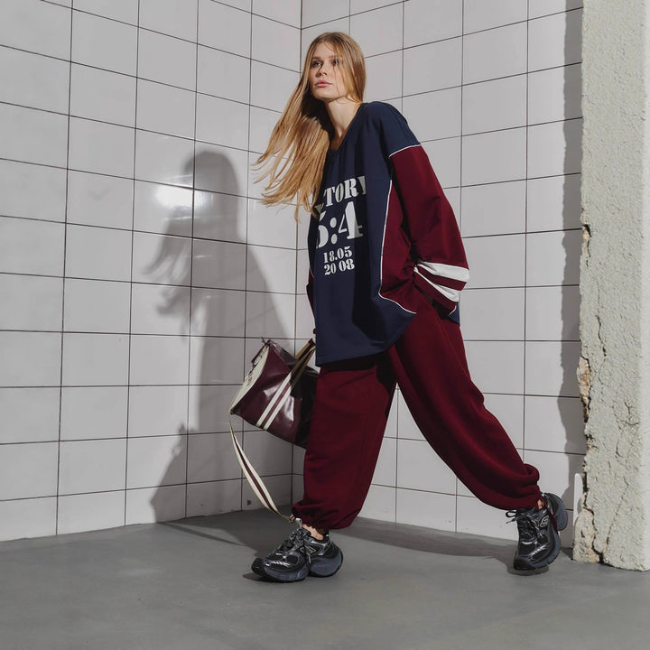 Kvinne Oversized Treningsdrakt med Grafisk Trykk og Bred Bukse Skjora