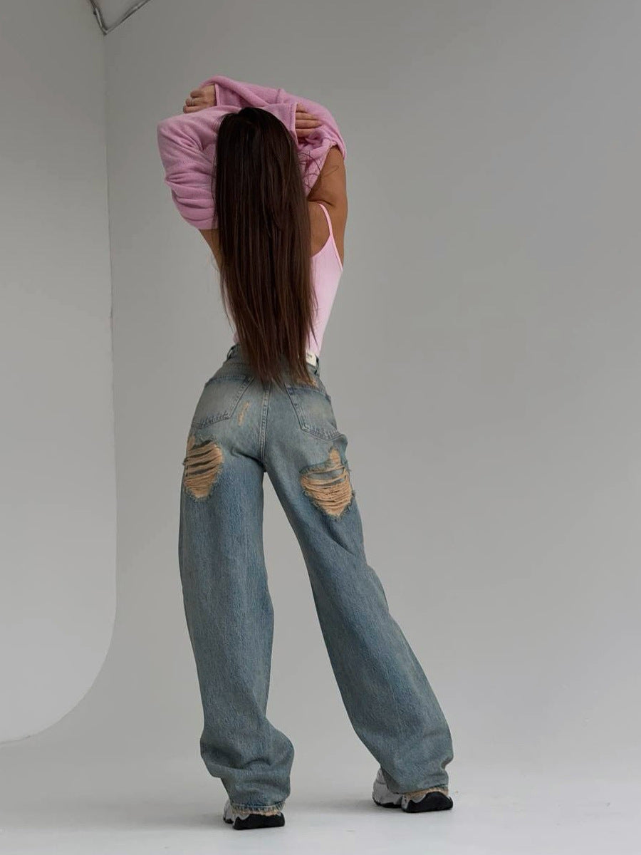 Kvinnenes Baggy Jeans i Vintage Stil med Slitte Detaljer og Høy Midje Skjora