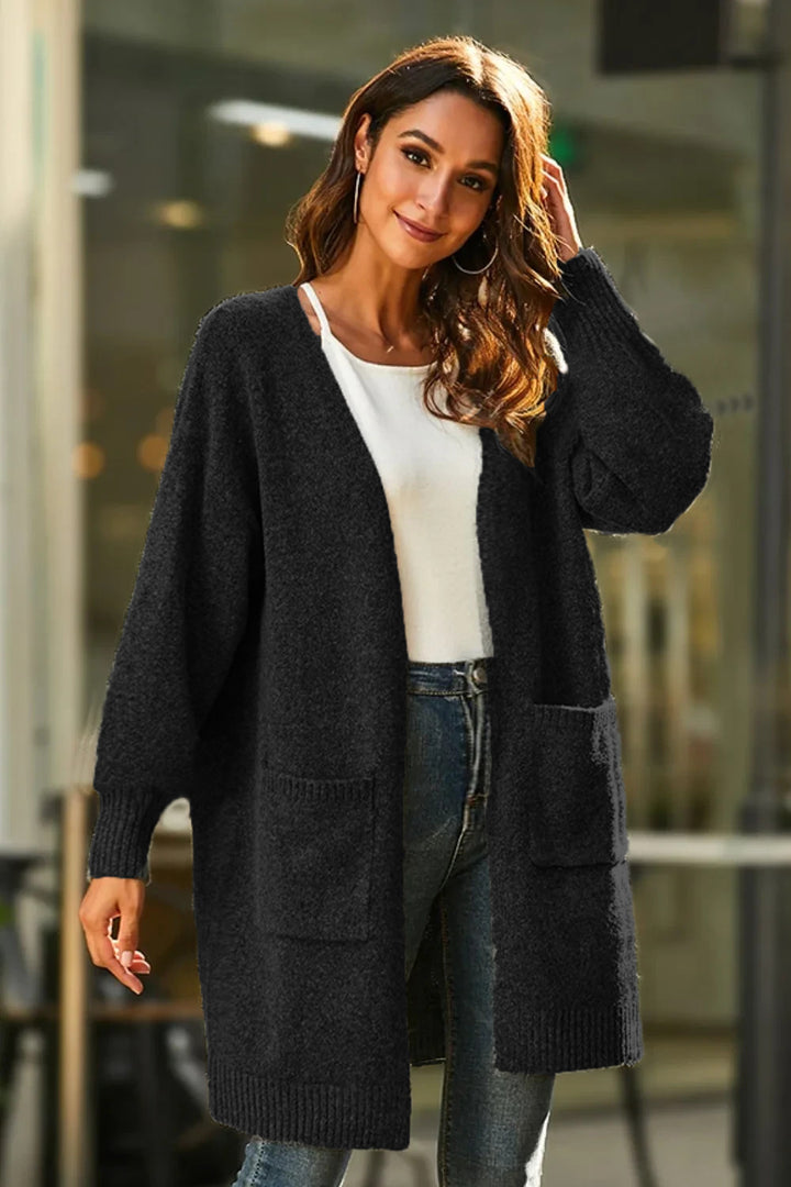 Kvinnes chunky strikket cardigan med dype lommer og vide ermer Skjora