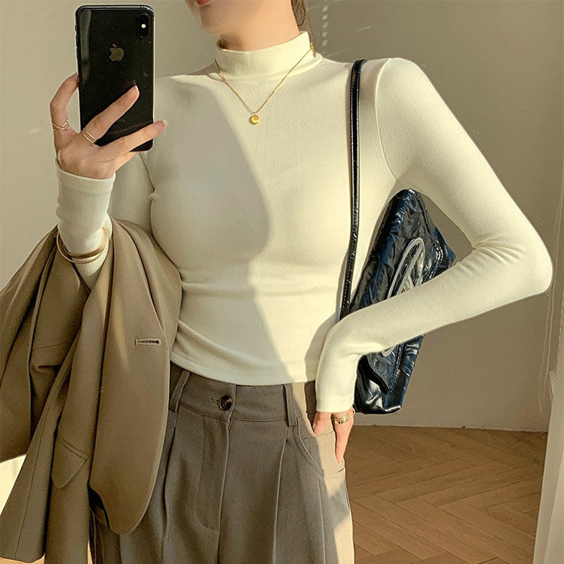 Kvinners langermet crop top med høy krage og tettsittende snitt