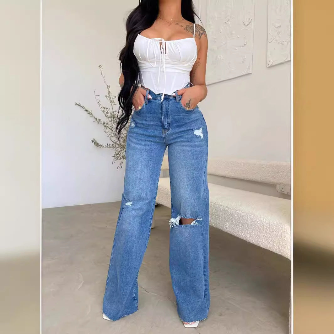 Kvinners vide jeans med slitte detaljer og høy livlinje Skjora