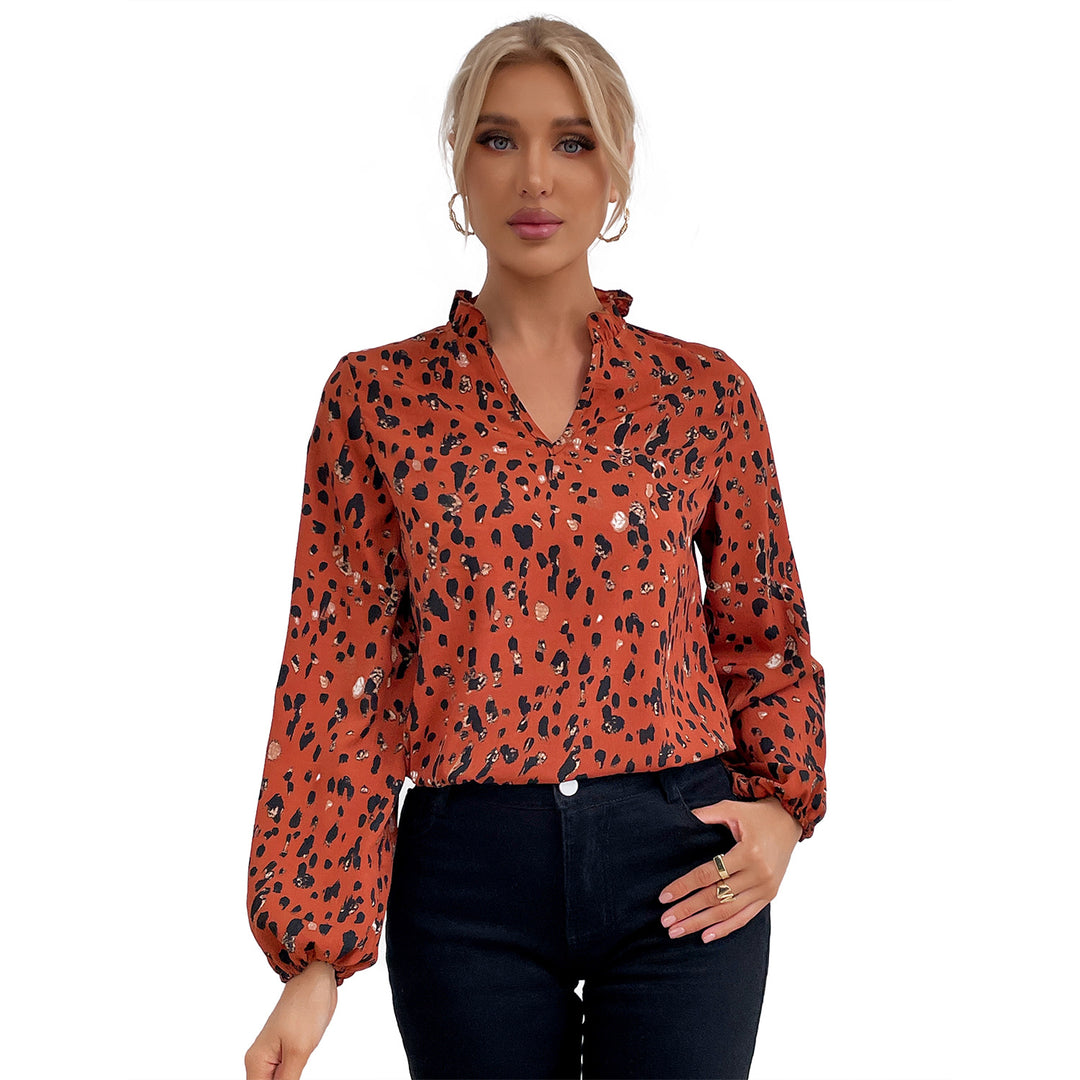 Damebluse med blomster leopardmønster og voluminøse ermer Skjora