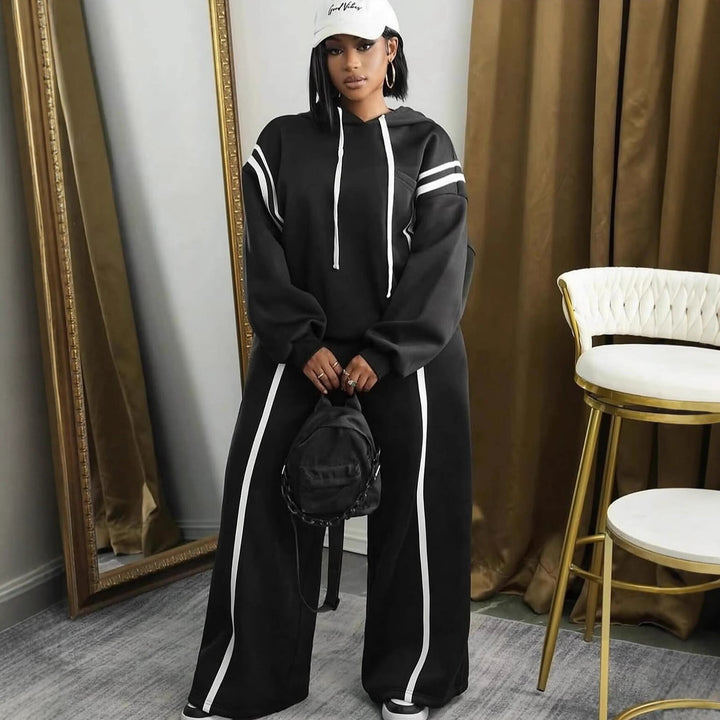 Dame sporty loungewear-set med oppbrettede ermer og sidestreker Skjora
