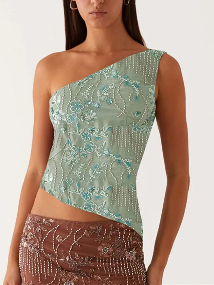 Kvinnes asymmetrisk topp med blomstret rhinestone-design Skjora