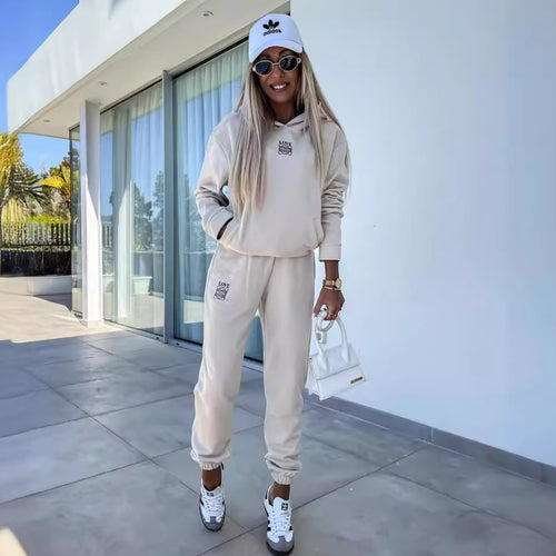 Dame sporty loungewear-set med hette og elastiske mansjetter Skjora
