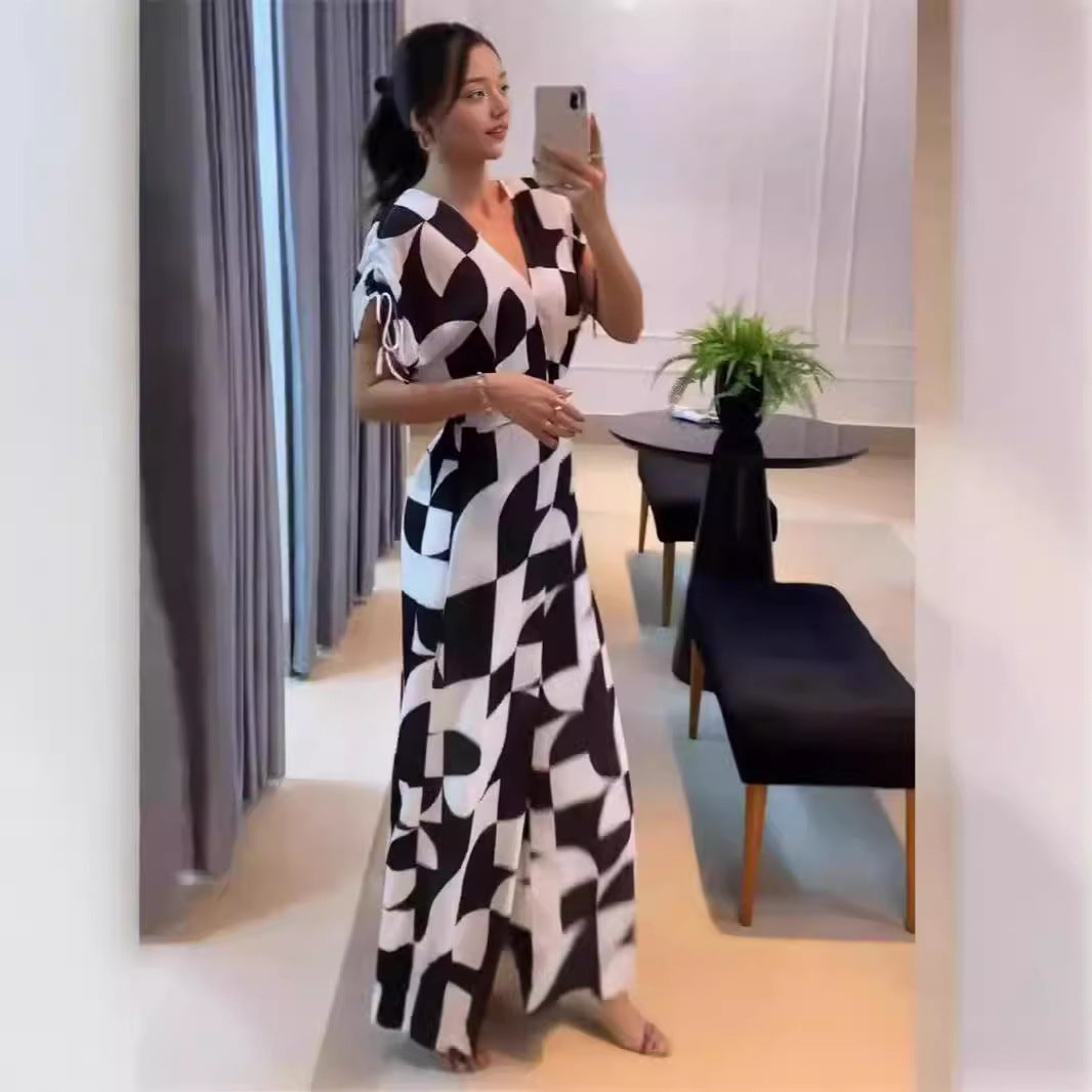 Damer Moderne Jumpsuit med grafisk mønster og elegante ermer Skjora