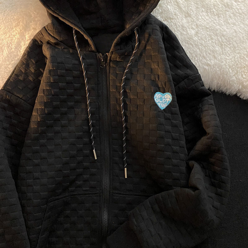 Dame hoodie-jakke laget av strukturelt materiale med praktiske lommer og fashionable design