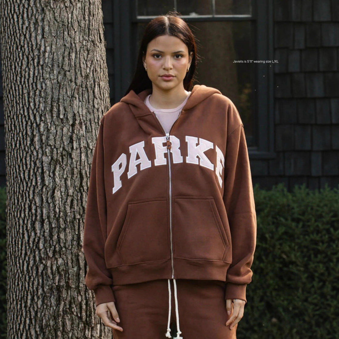 Kvinne hoodie med iøynefallende tekst og myk indre fôr Skjora