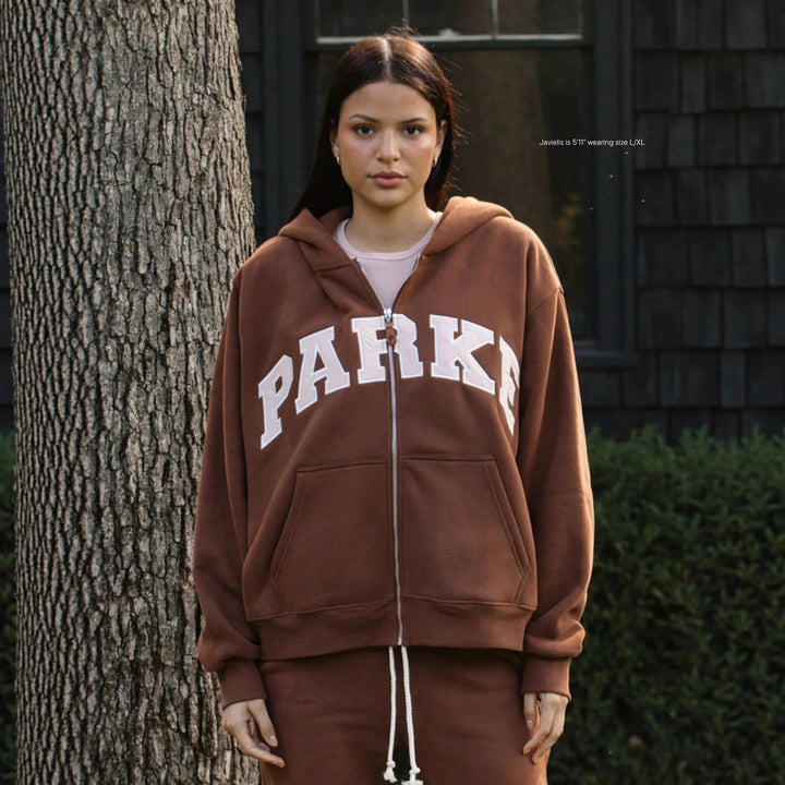 Kvinne hoodie med iøynefallende tekst og myk indre fôr Skjora