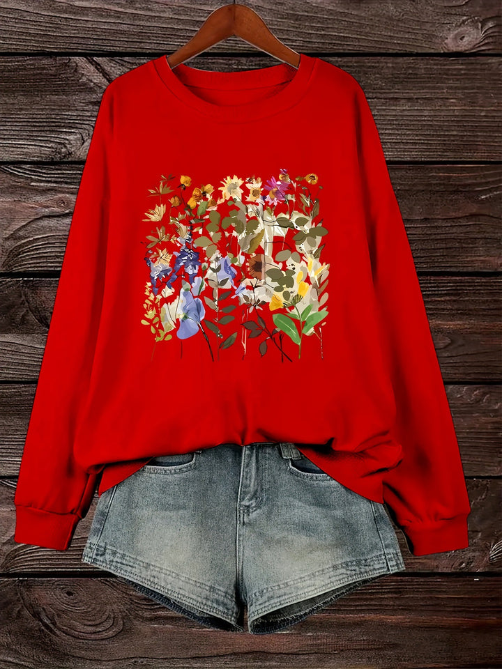 Dame sweatshirt med blomsterdesign og komfortabel passform Skjora