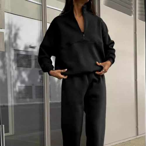 Sporty sweatshirt-set for women with high collar and elastic cuffs Skjora
