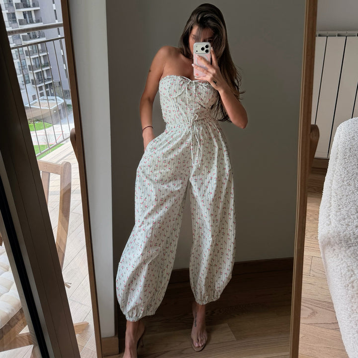Dame jumpsuit med lekent blomstermønster og elastisk midje snor Skjora