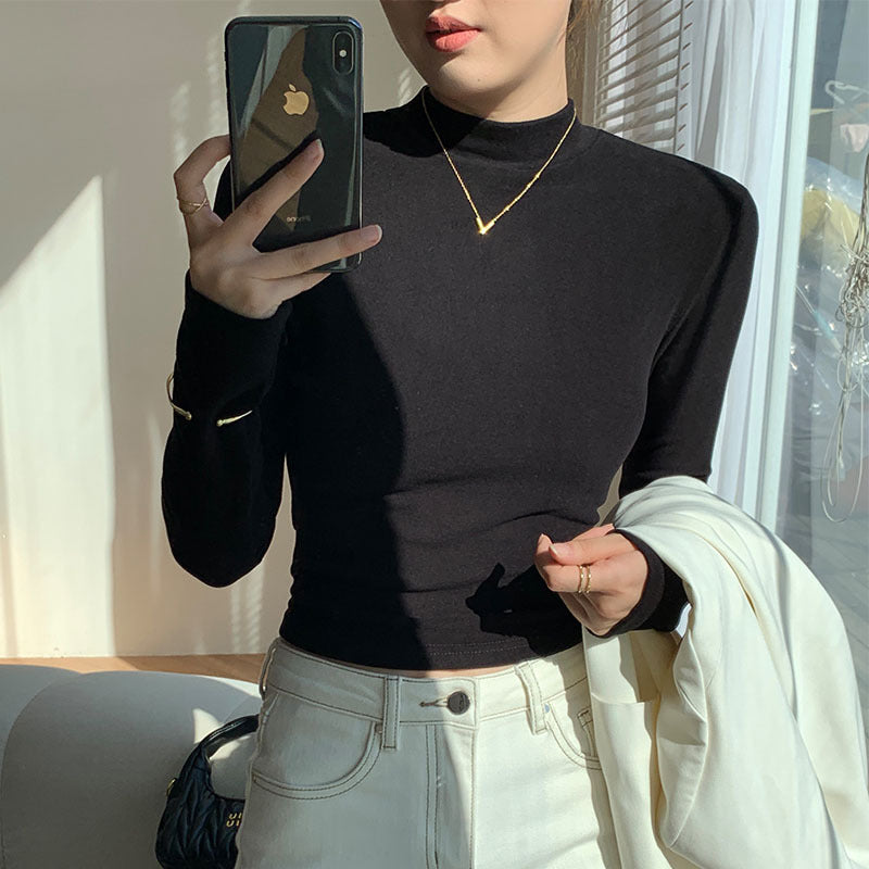 Kvinners langermet crop top med høy krage og tettsittende snitt