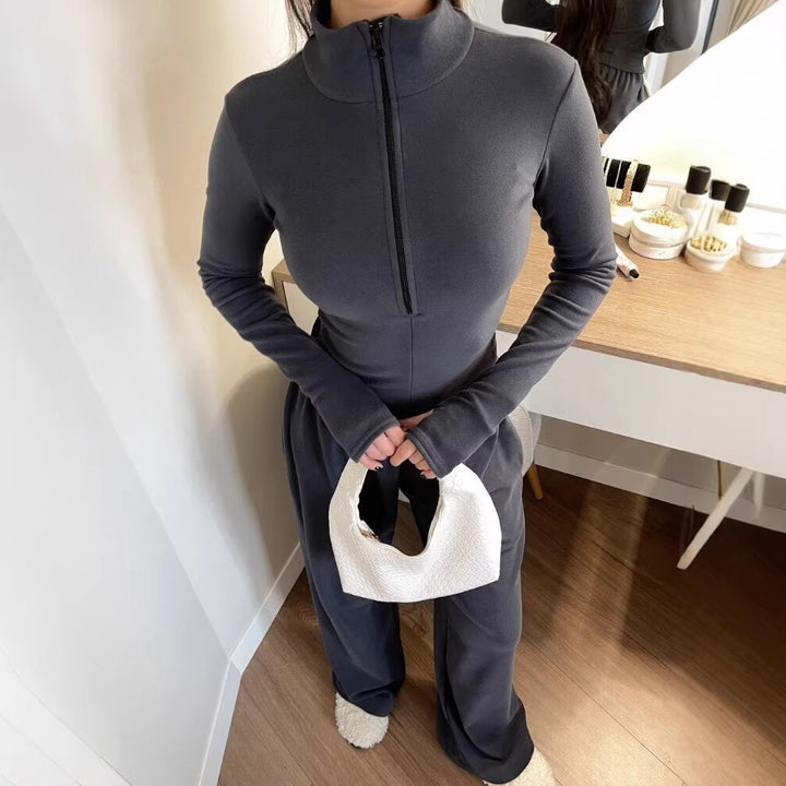 Dame joggedress med moteriktig glidelås og lange ermer Skjora