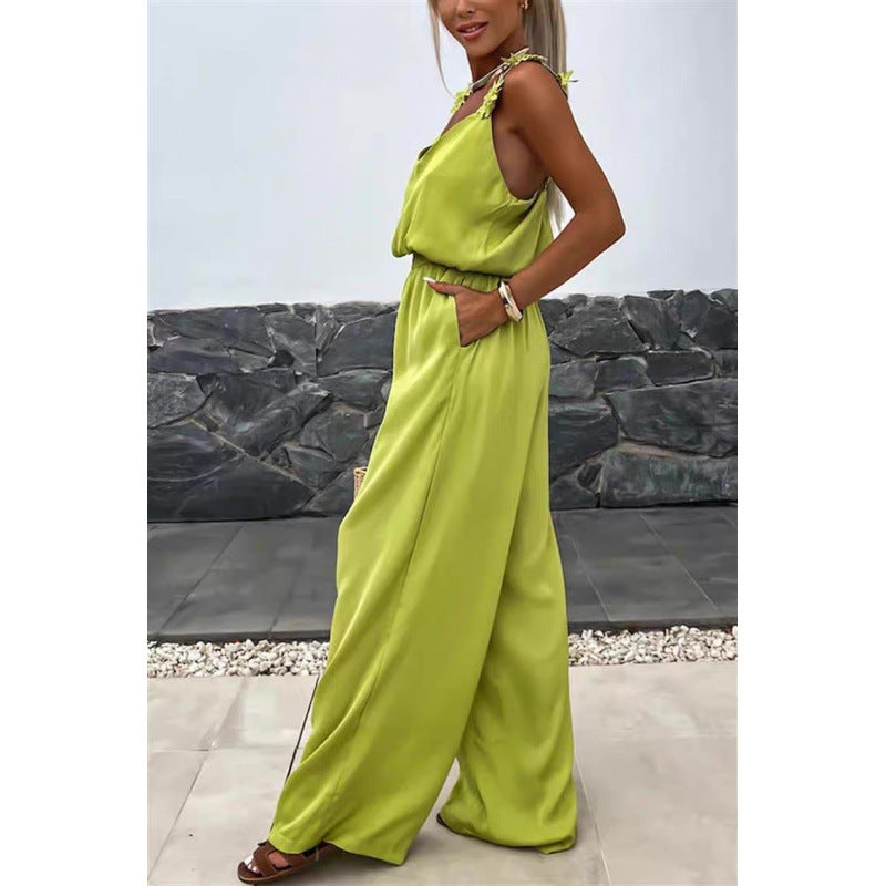 Dame jumpsuit med blomstrete volanger og vide ben Skjora