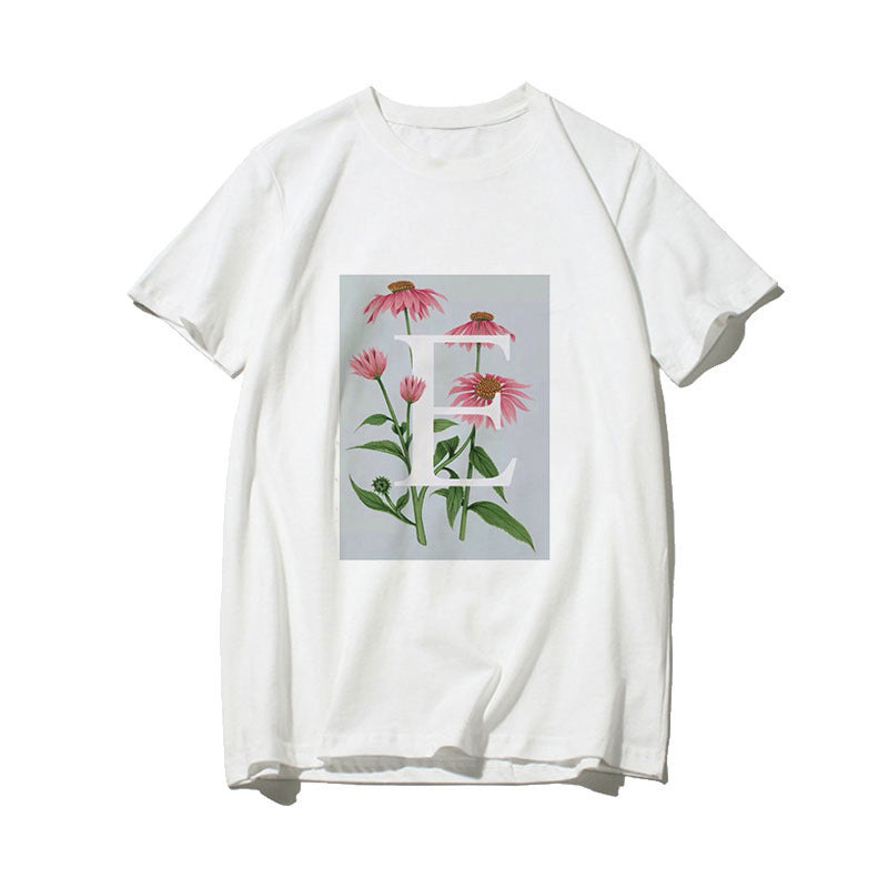 Dame T-skjorte med blomsterdesign og kreativt trykk Skjora