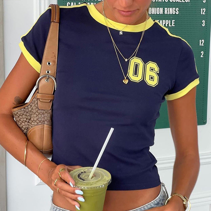 Damer trendy cropped T-skjorte med iøynefallende sportslige detaljer Skjora