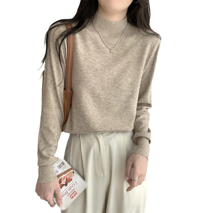 Women's fine-knit sweater with a modern stand-up collar and a relaxed fit Skjora
