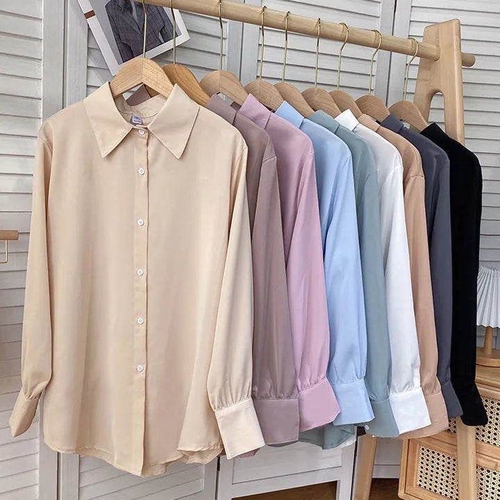 Kvinnens elegante bluse med voluminøse ermer Skjora