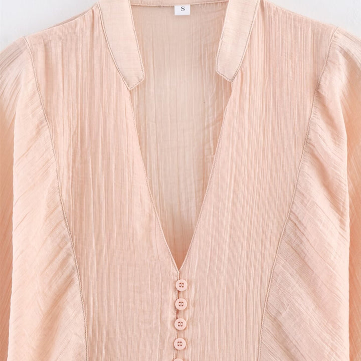 Damer elegant bluse med dyp V-hals og strukturerte ermer Skjora