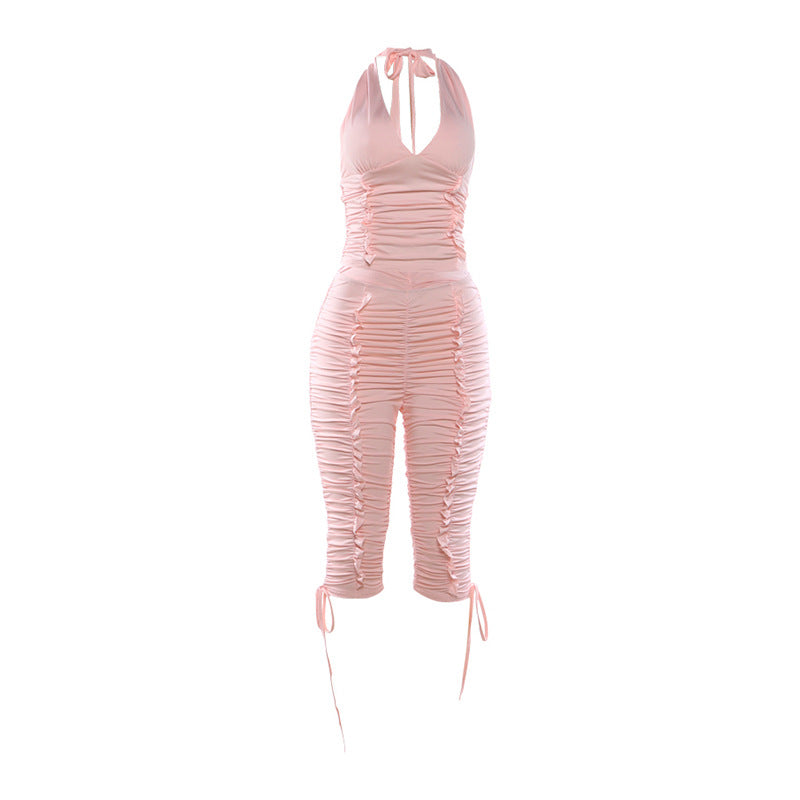 Dame jumpsuit med raffinerte rynkeelementer og stilige bånd