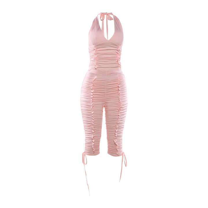 Dame jumpsuit med raffinerte rynkeelementer og stilige bånd