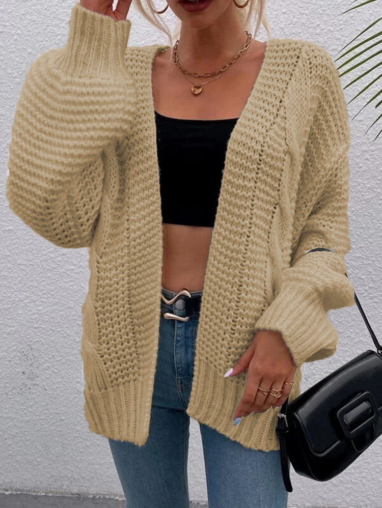 Kvinnens chunky strikket cardigan med komfortable åpne lommer og avslappet passform Skjora