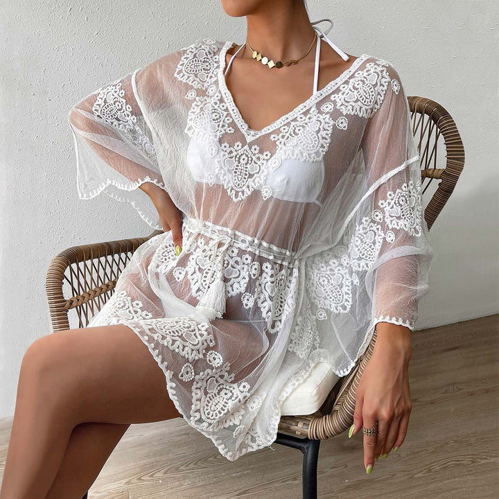 Women's elegant crocheted beach tunic with cut-out belt and ruffled sleeves Skjora