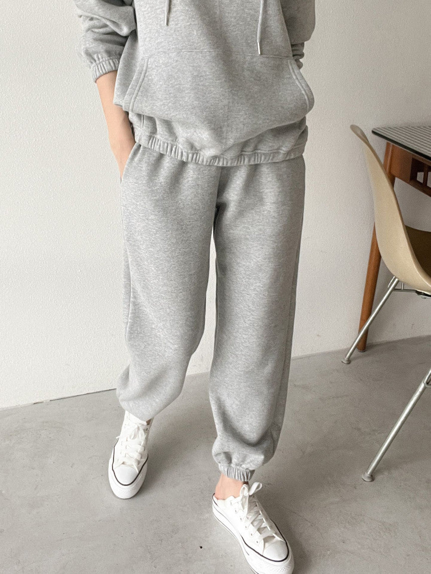 Kvinne Casual Hoodie og Joggebukse Sett med Elastisk Liv og Praktiske Lommer Skjora