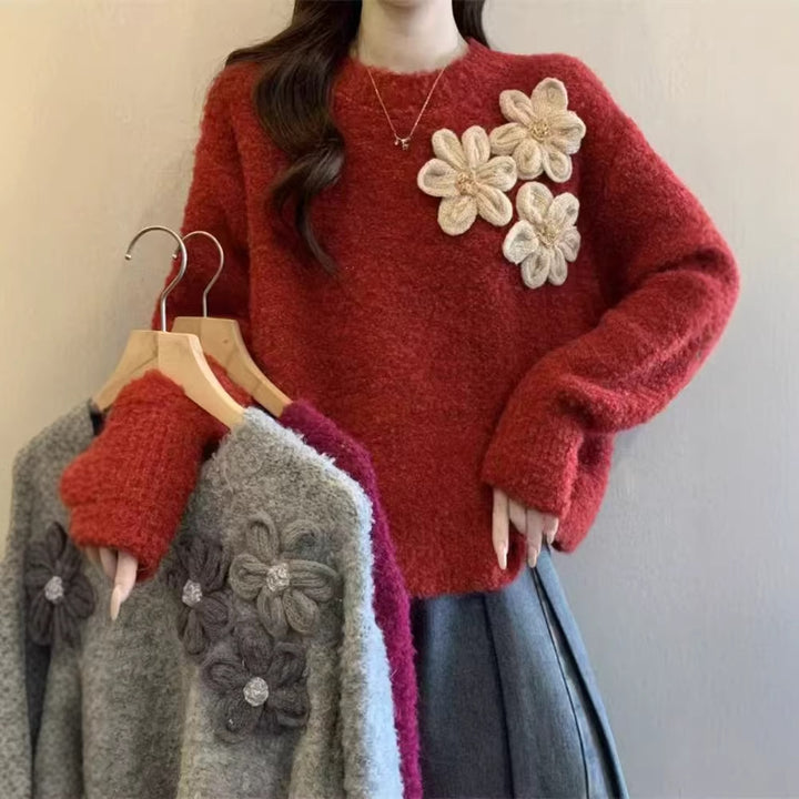 Kvinnens koselige genser med blomstrete 3D-design Skjora