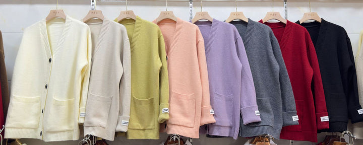 Damenes uformelle oversized cardigan med store lommer og knappdetaljer Skjora
