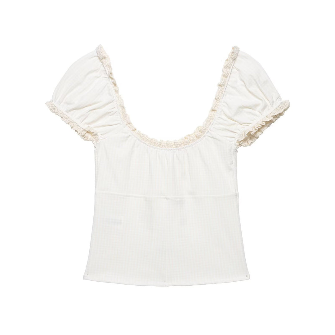 Ladies' top with elegant ruffle edge Skjora