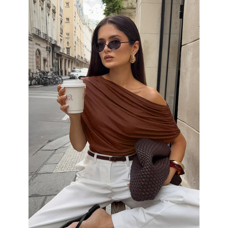 Women's asymmetrical top with relaxed draped design Skjora